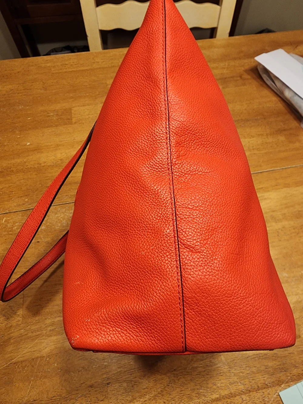 This Kate Spade Larchmont Avenue Logo Penny Tote in chili red